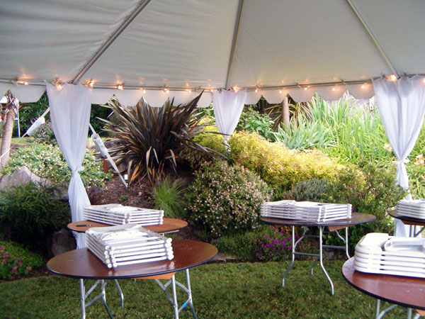 Tent install around flowerbed